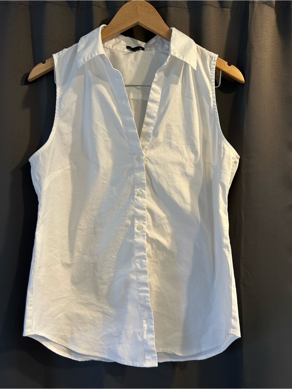 White button up sleeveless top